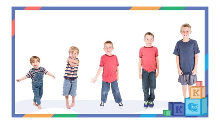 Group of children standing in front of a white wall