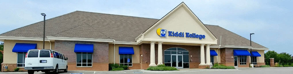 wide shot of the front of Kiddi Kollege’s Falcon Ridge building