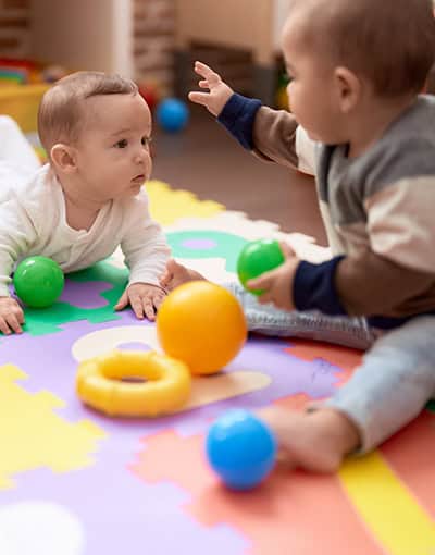 Babies Playing Together At Daycare
