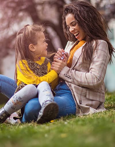 Mother Daughter Playing Together Outdoors